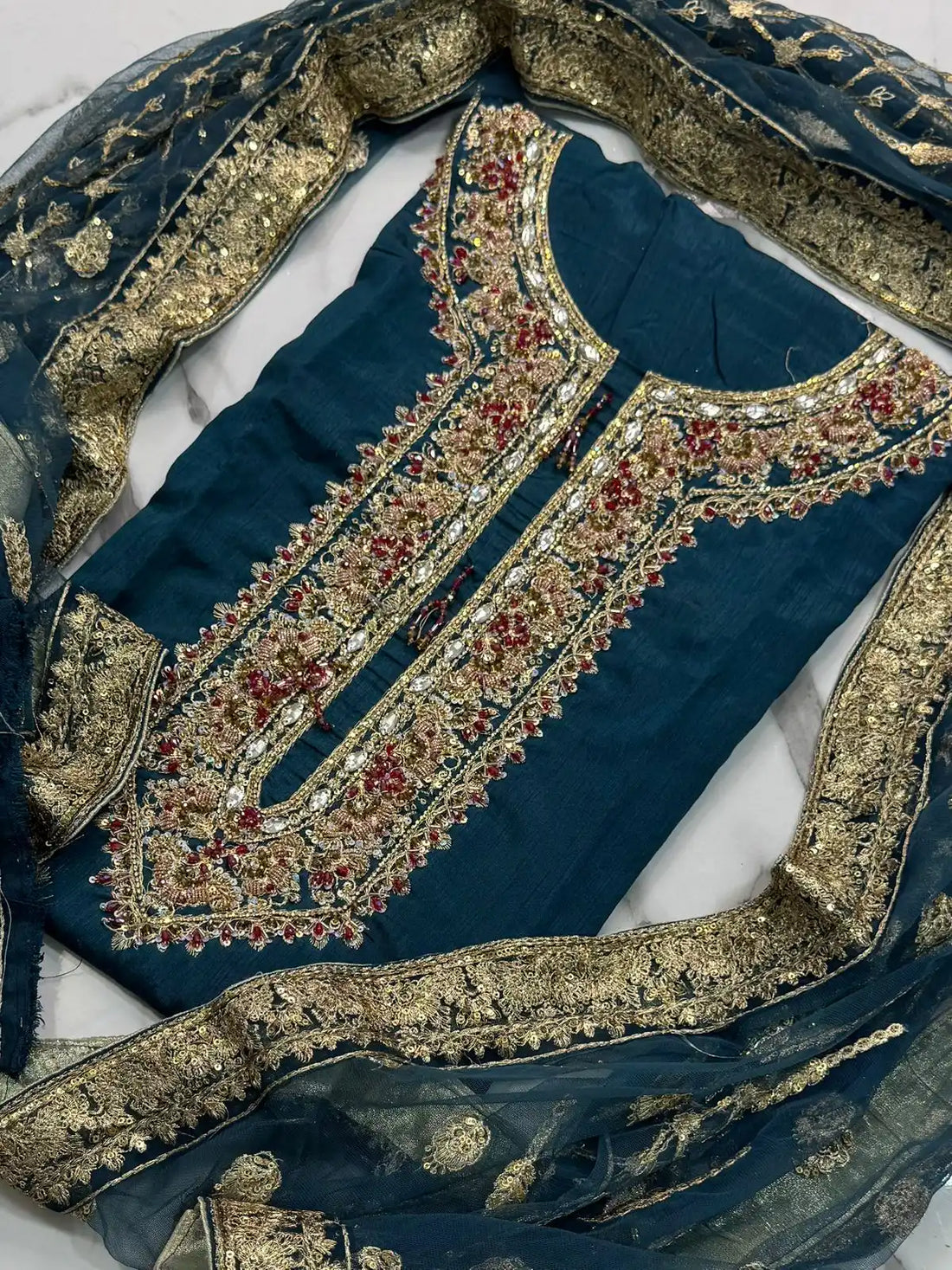 4PC RAW SILK FANCY SUIT FULLY. EMBROIDERED WORK